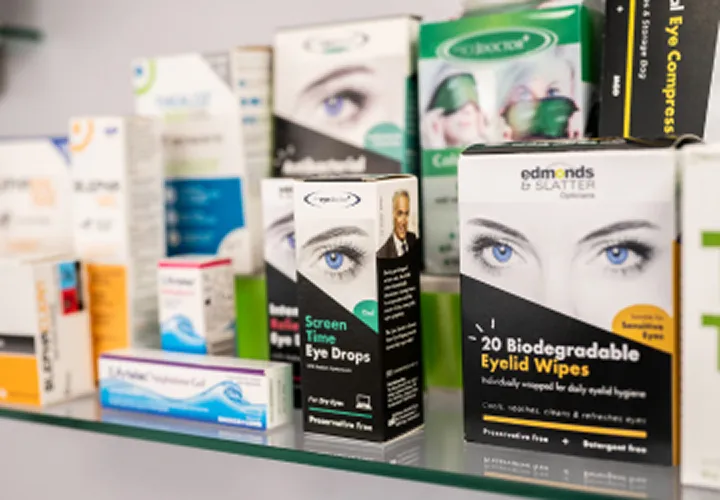 Shelf display of eye care products including screen time eye drops and biodegradable eyelid wipes.
