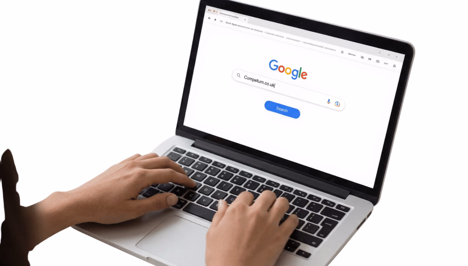 Web design Lincolnshire and SEO: hands typing on a laptop showing a Google search
