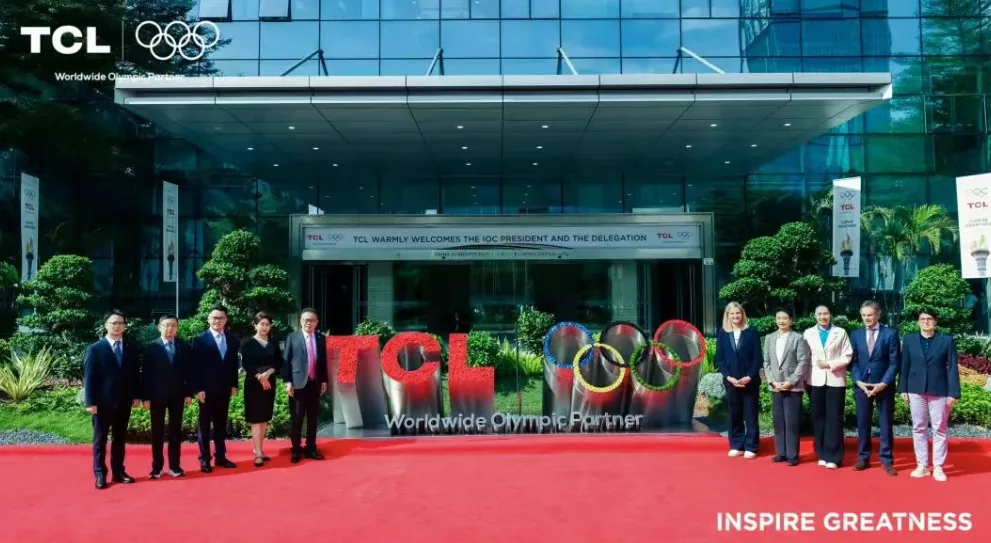 The TCL and Olympic Rings installation being unveiled