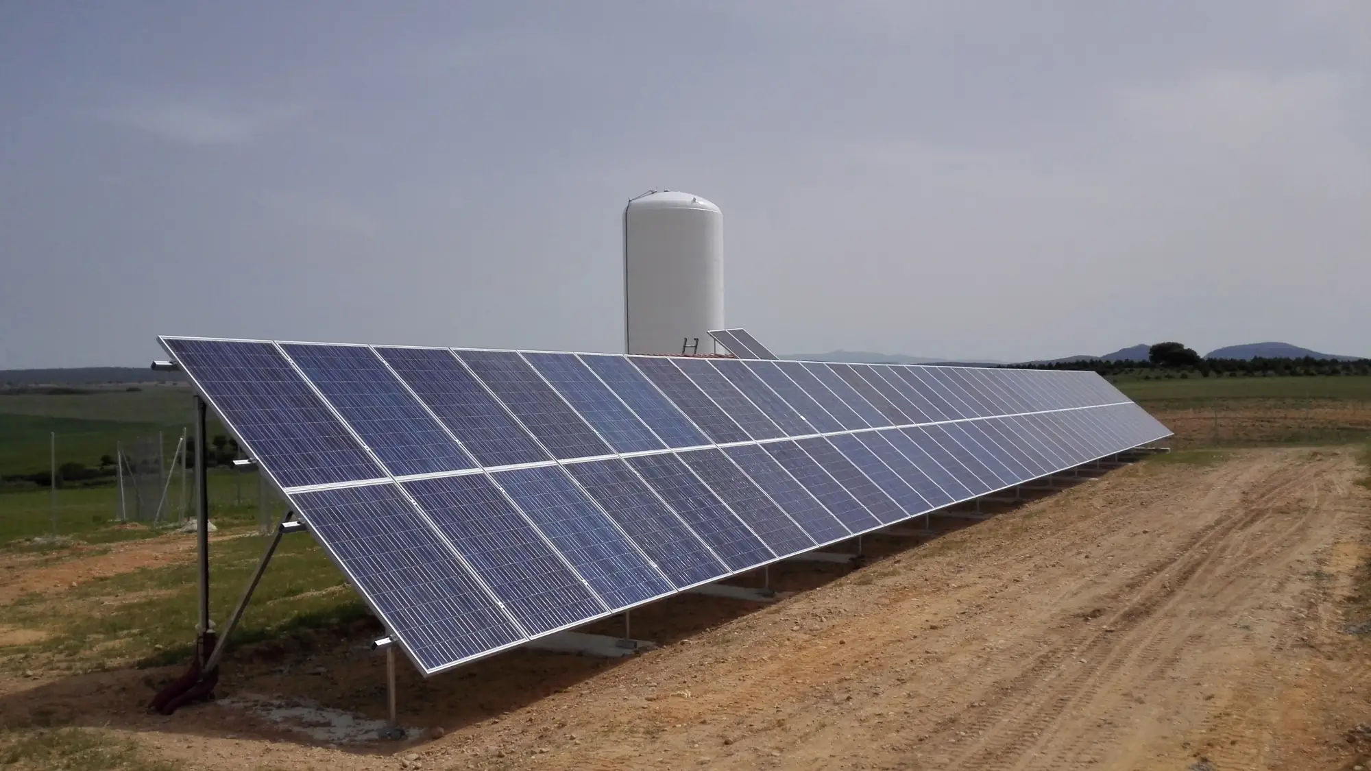 Original 34.56 kWp solar array installed in 2015 to power off-grid water pumping at a farm in Burgos, Spain