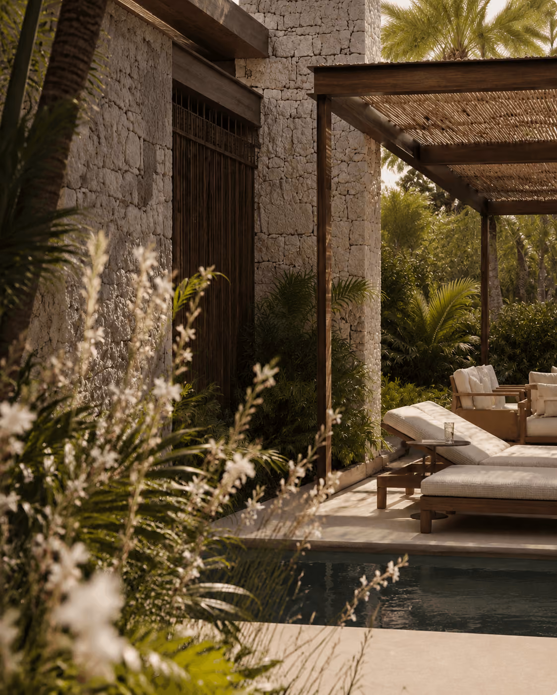 Villa Aruna outdoor lounge with sun deck surrounded by tropical plants