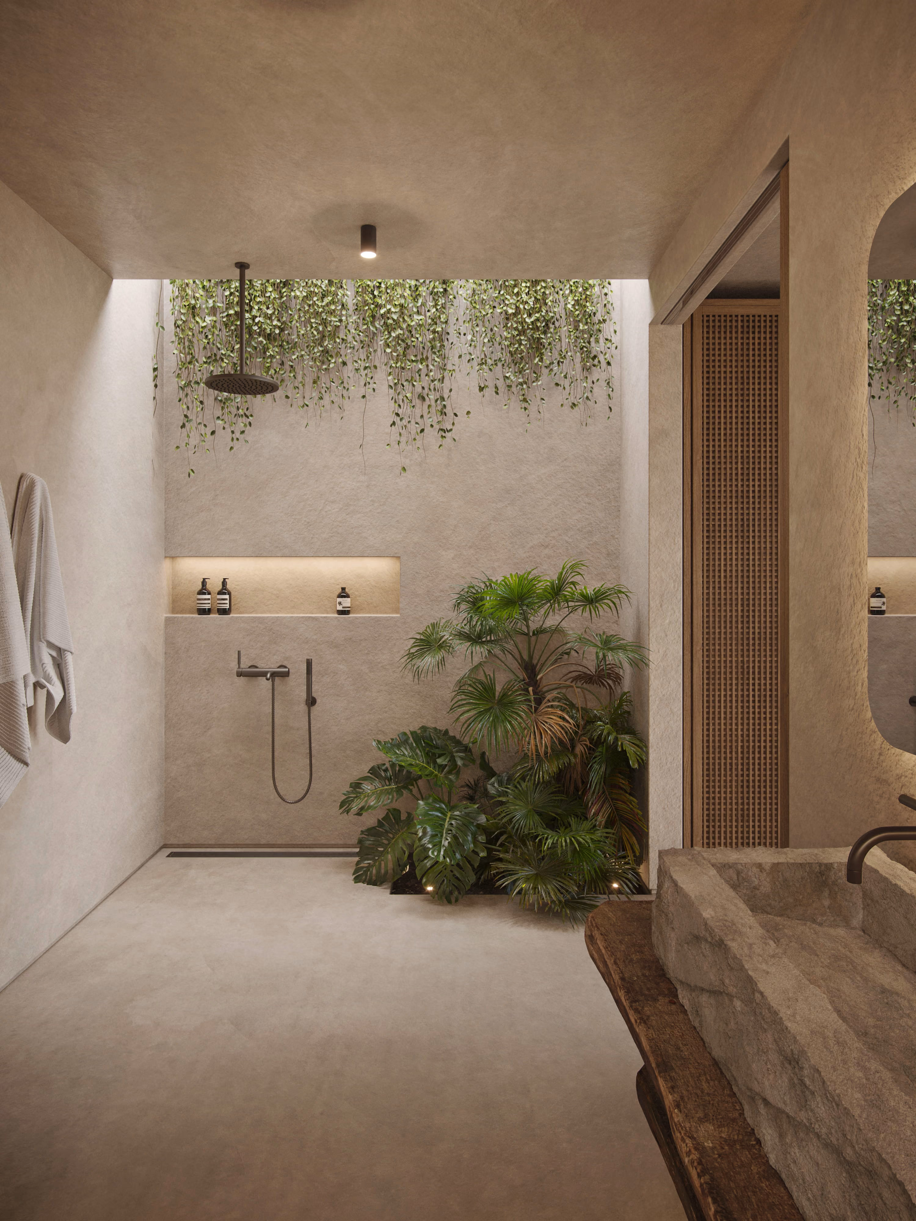 Villa Muara outdoor-style shower with hanging plants and stone finishes