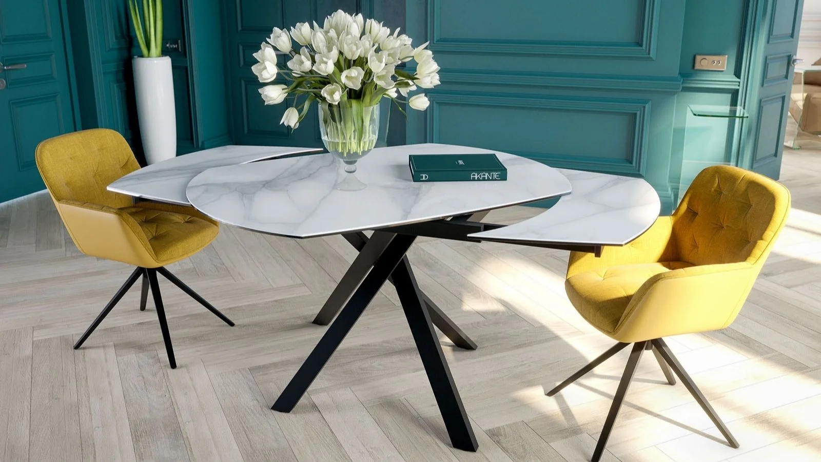Table ronde Akante moderne en marbre blanc avec pieds noirs et deux chaises au revêtement jaune, dans une pièce lumineuse.