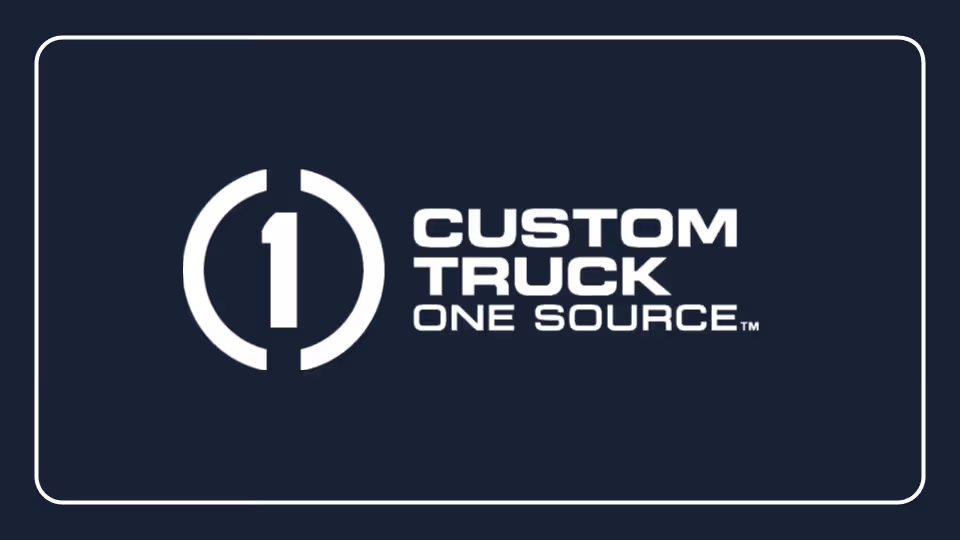 Custom Truck One Source logo in white text on dark blue background with rounded white border frame.