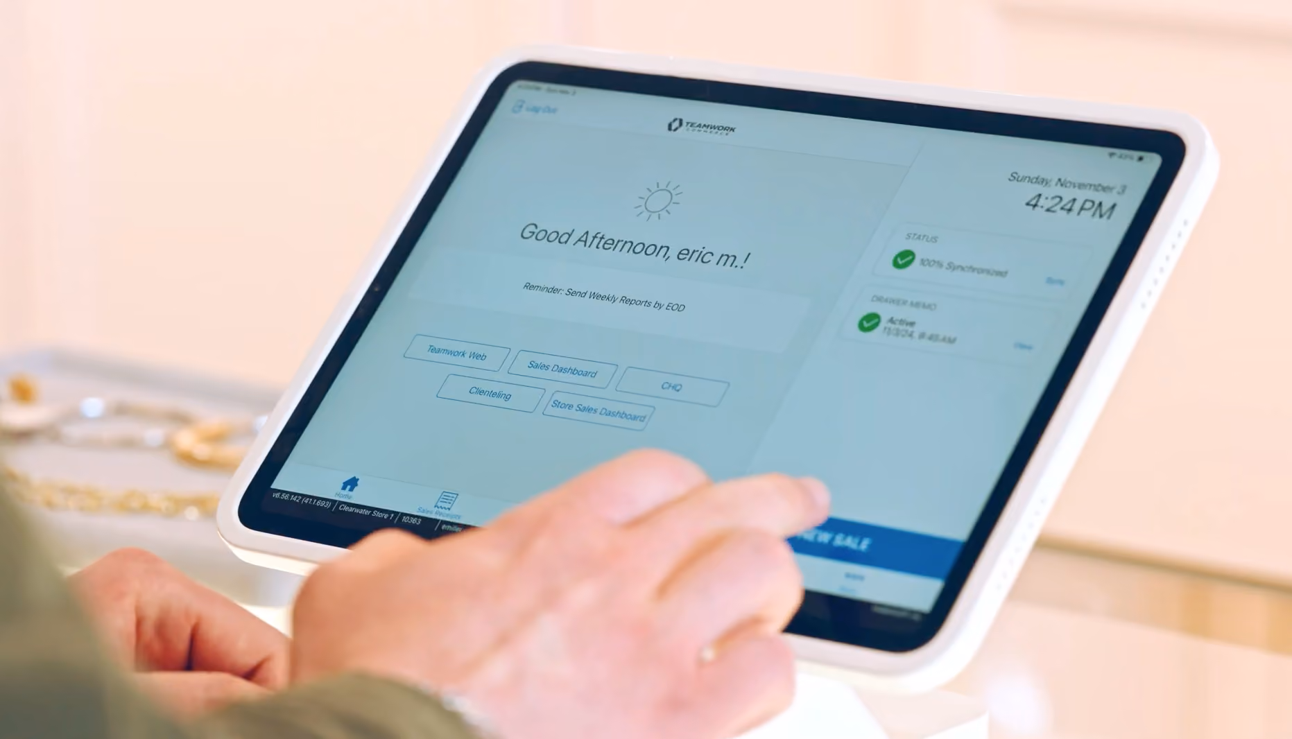 Tablet screen showing a dashboard greeting 'Good Afternoon, eric m.!' with clickable options and status info.