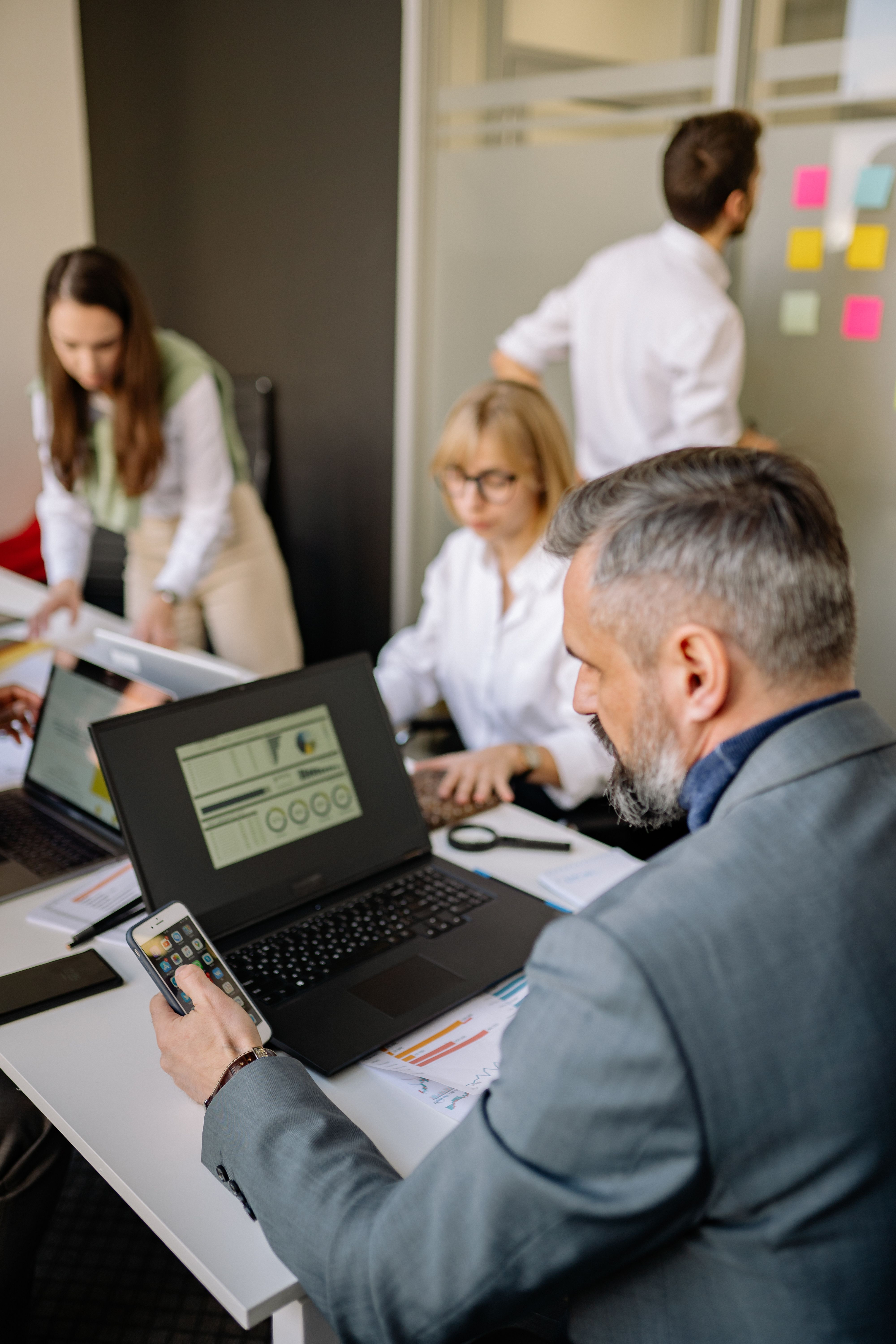 Practitioners working through a real business problem together