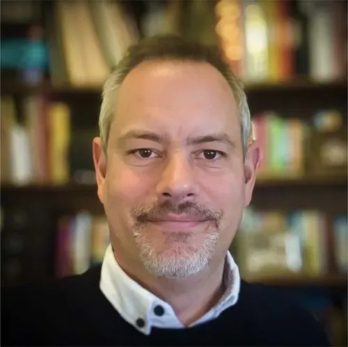 Headshot of Tim Olsen, Automation Director.