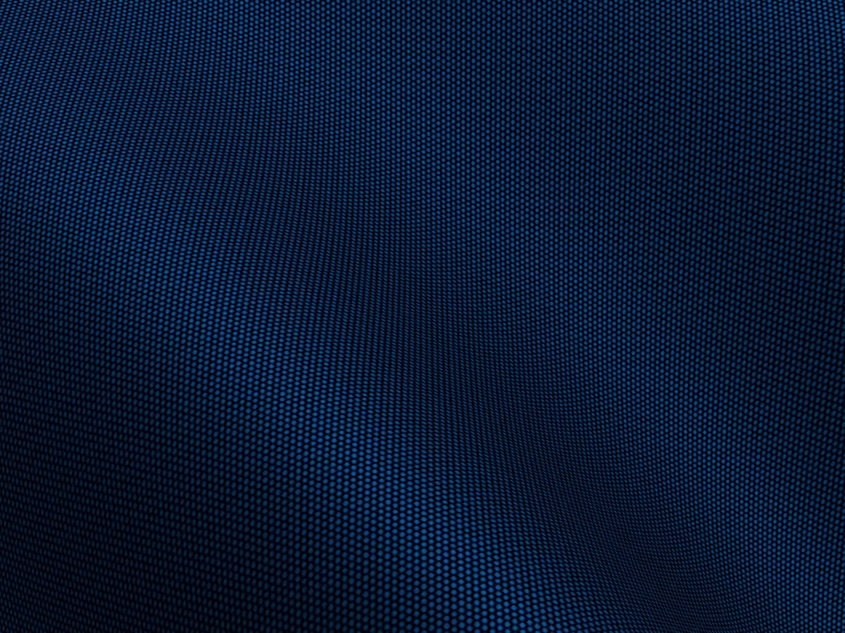 Close-up of navy blue fabric with a small dot mesh weave texture creating a subtle wave pattern.