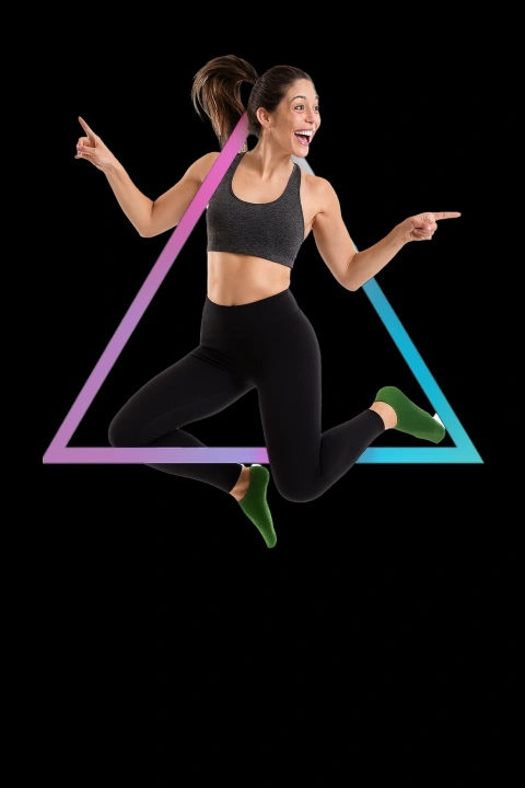 Woman jumping with energy in fitness apparel, representing fun, low-impact workouts at Bounc'd NQ in Earlville, QLD.