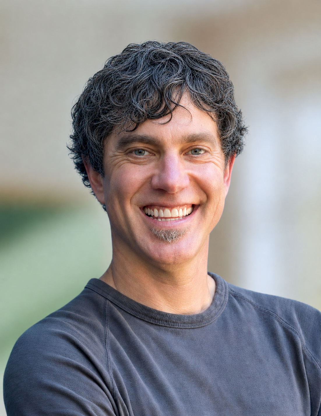Mr. Devoto smiling