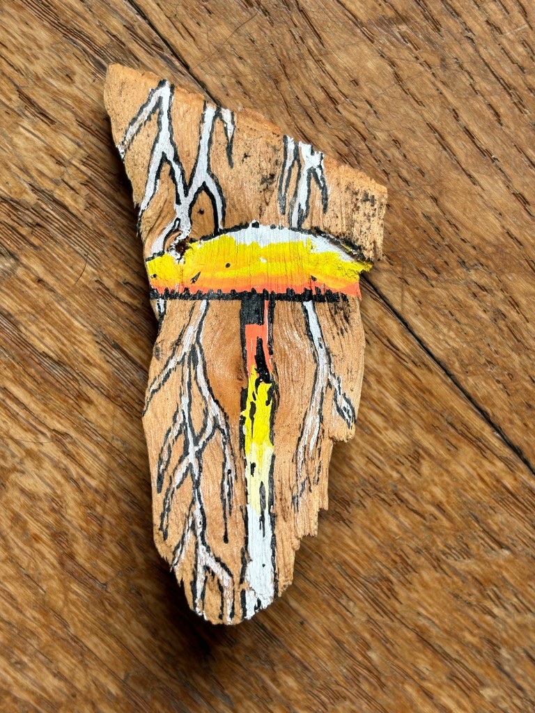 Painted wood fragment with roots