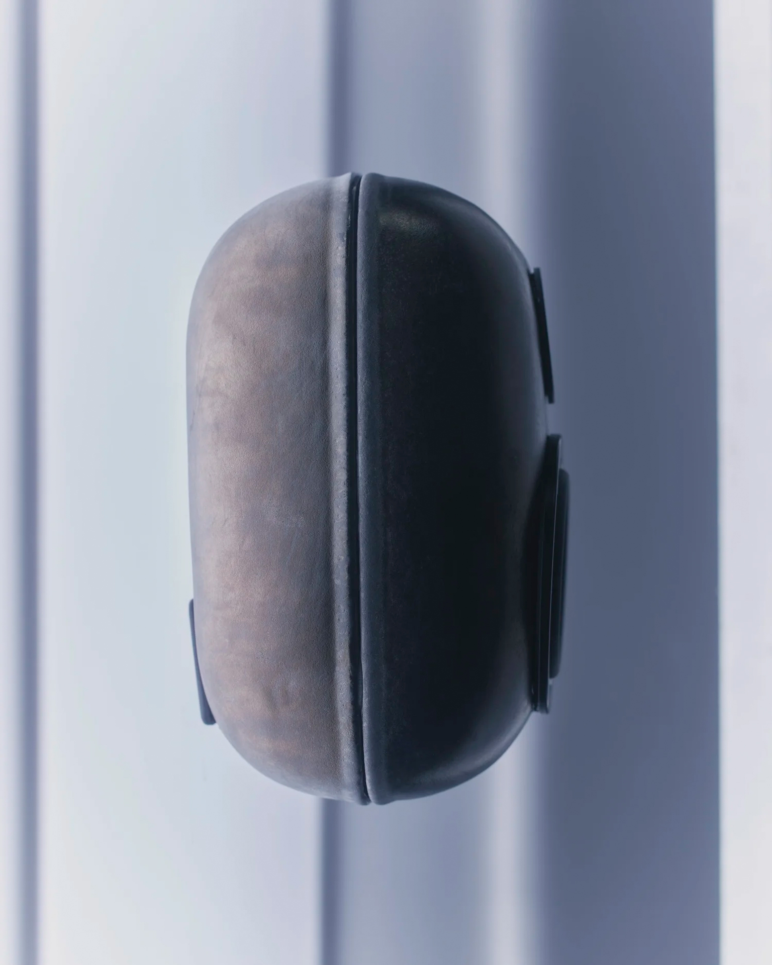Side view of a handcrafted cast speaker by MYCO AUDIO
