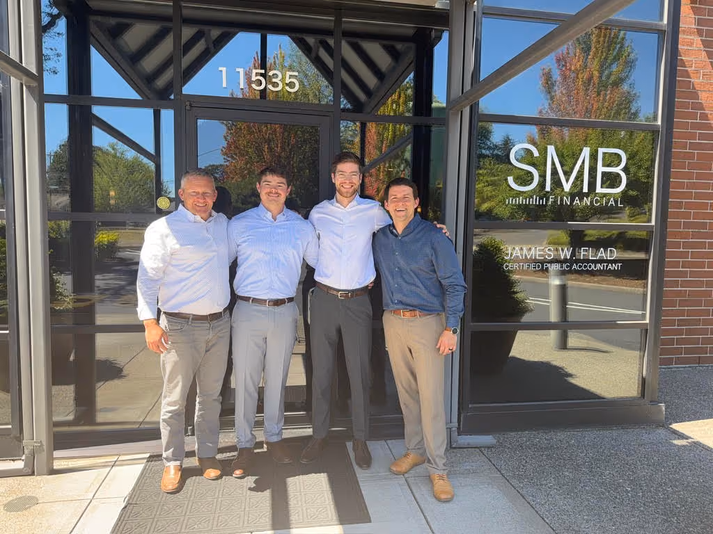 The team at SMB Financial all standing outside of their office.