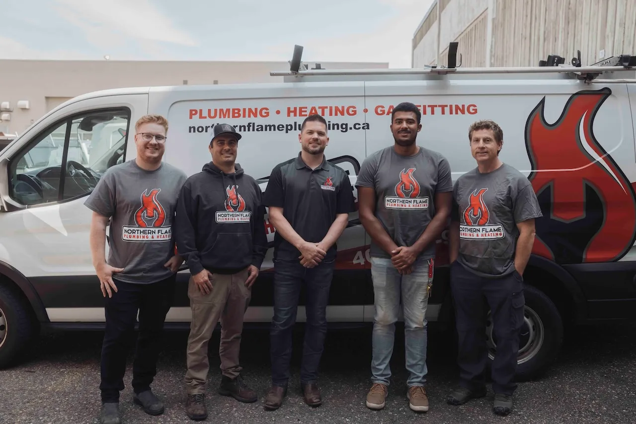The Northern Flame team of five in front of a branded plumbing, heating and gas fitting van