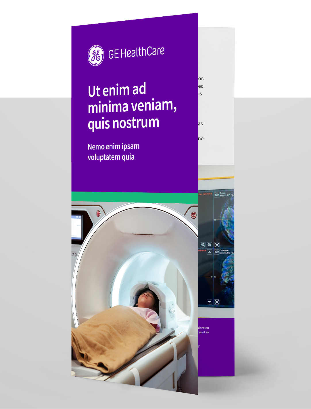 GE HealthCare purple banner stand beside a medical imaging scanner