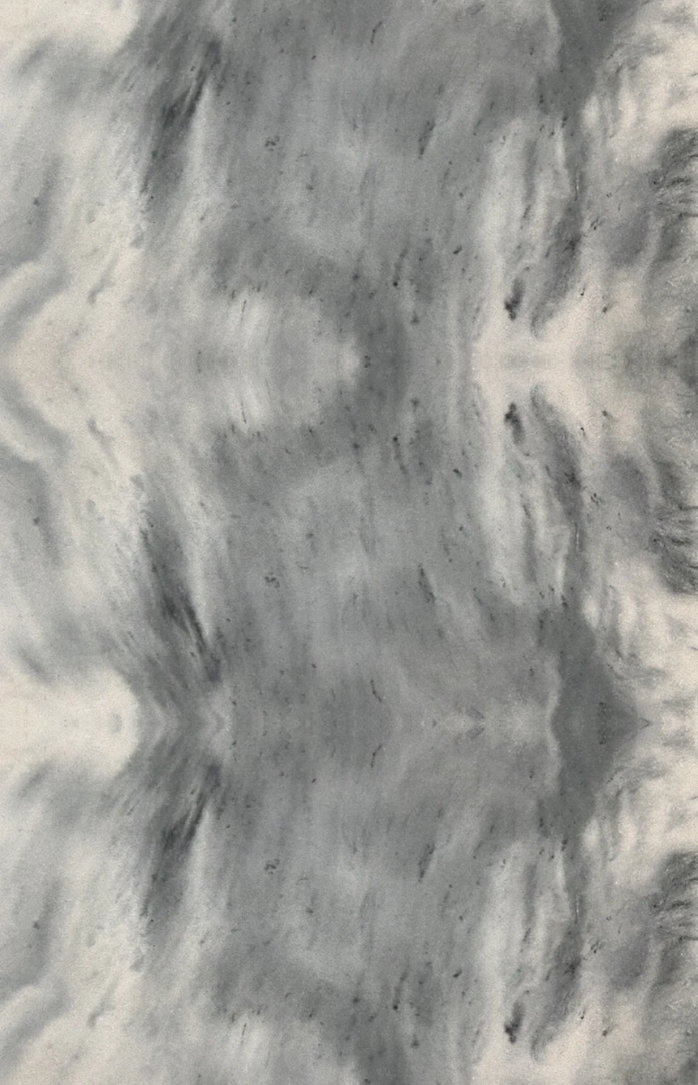 Close-up of a hand-finished concrete surface showing texture and tonal movement