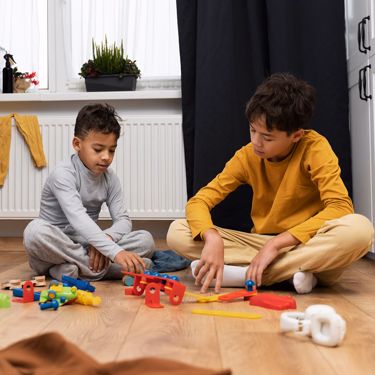 Child engaged in child-centered play therapy with toys in a warm therapy room