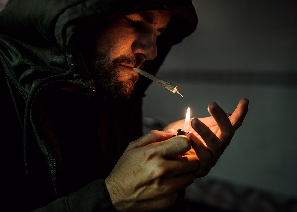Adult in a calm, honest conversation with their therapist, part of ongoing addiction recovery work