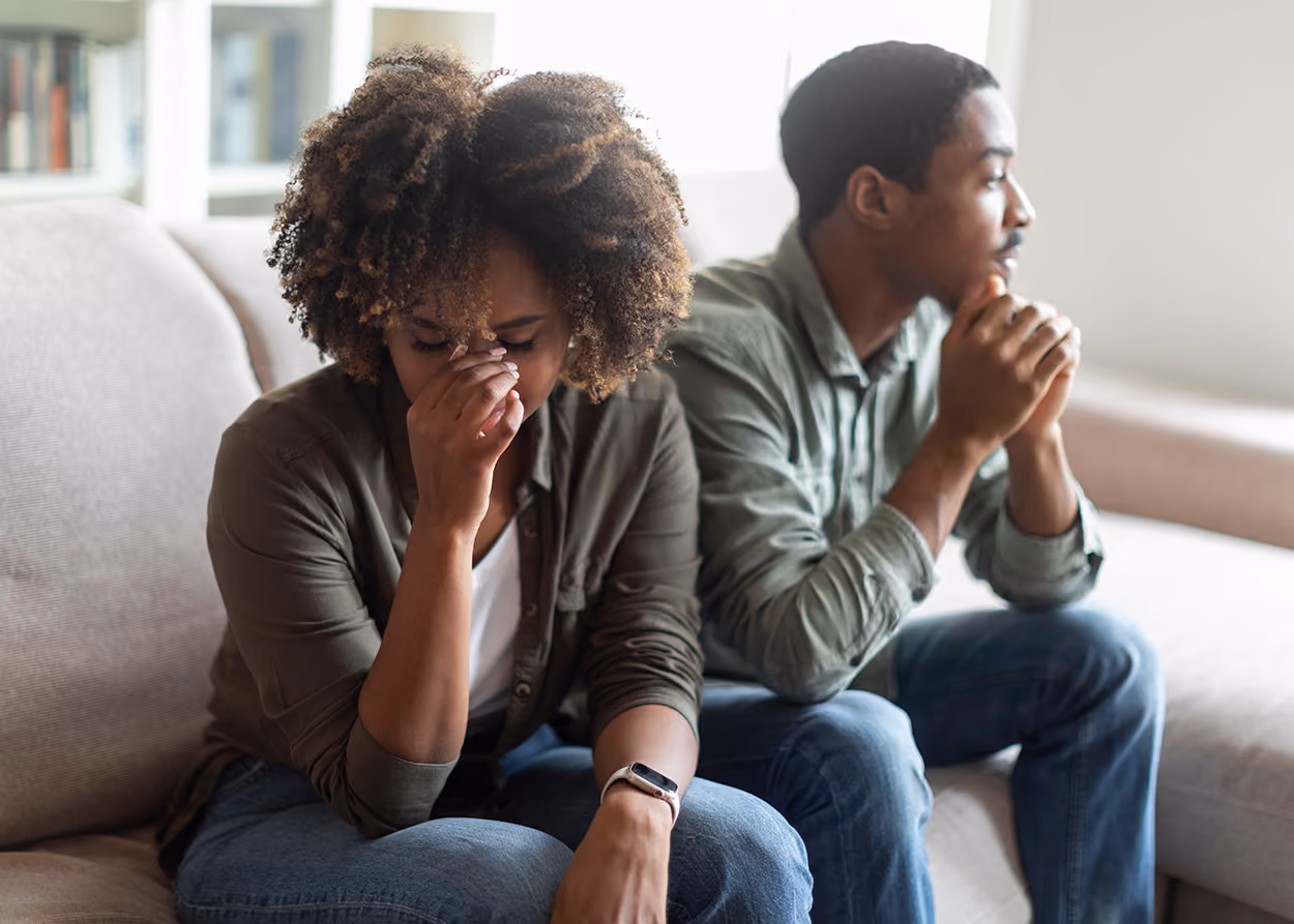 Two adults in a quiet, honest conversation, illustrating the relational repair of complex trauma in Plano TX