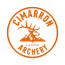 Orange circular logo with a stylized smiling-skull face and text around it.