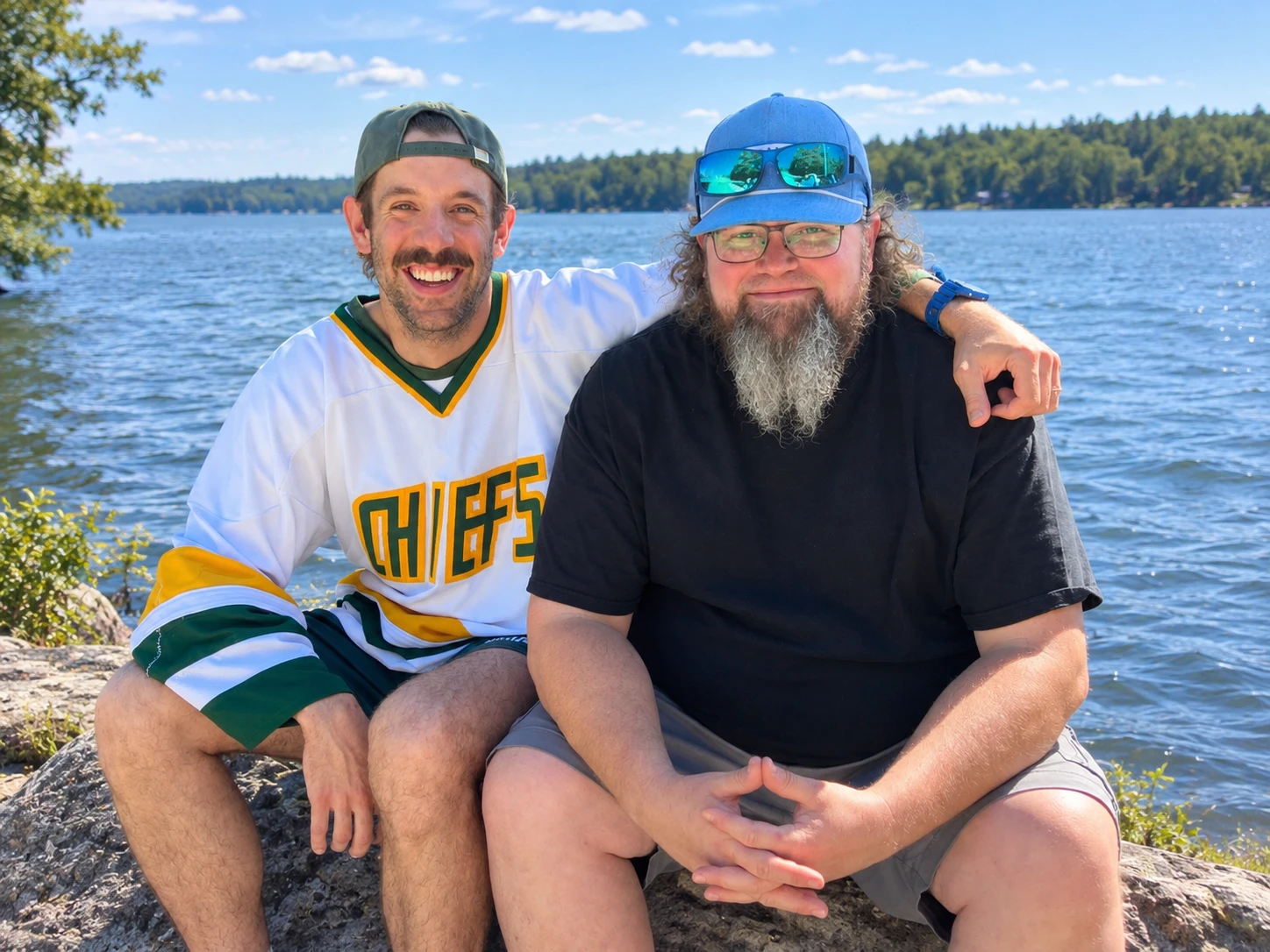 Kilcoo's camp directors on the shore of Gull Lake in summer