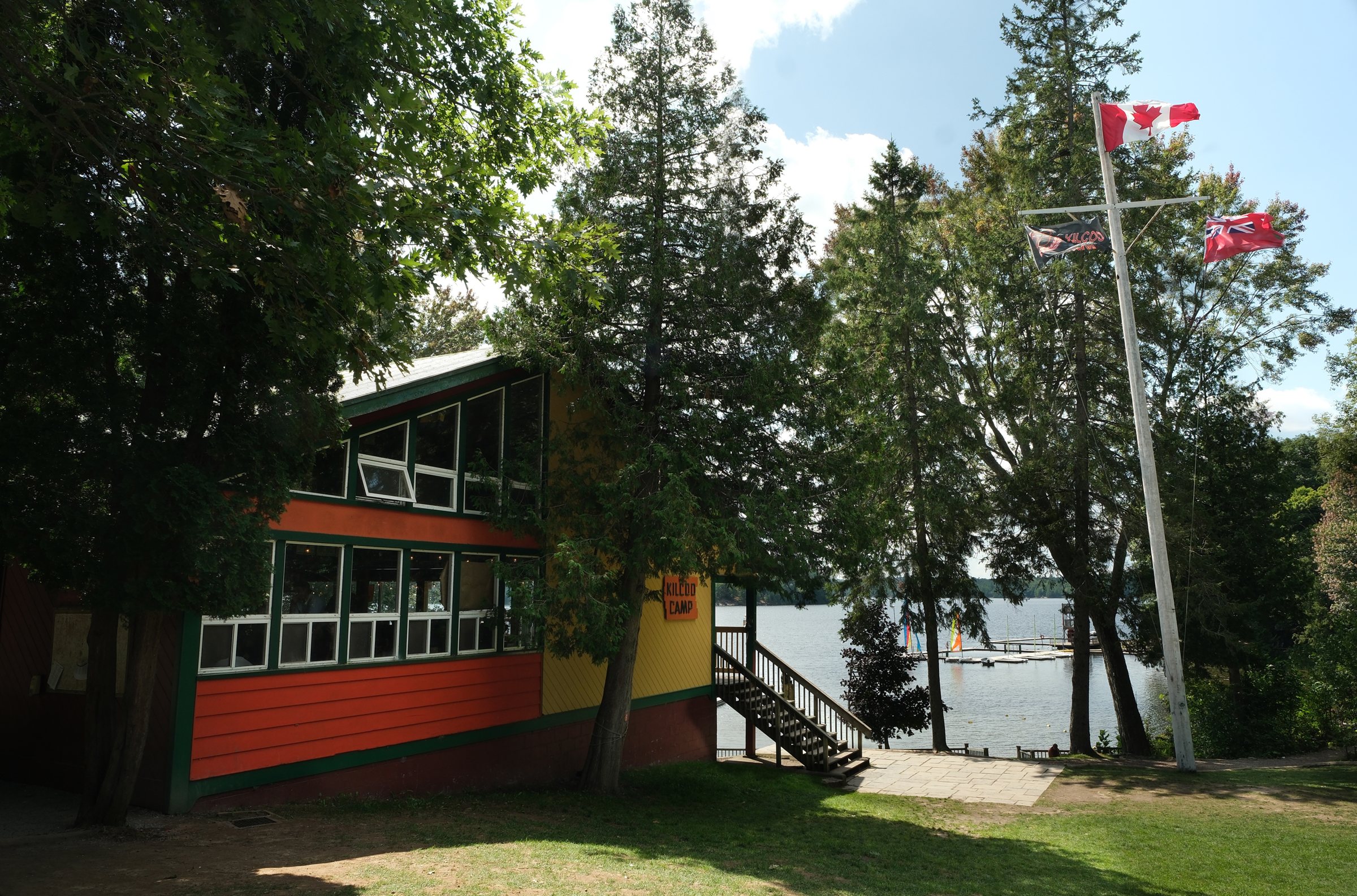 The Lodge at Kilcoo Camp with the flagpole in front