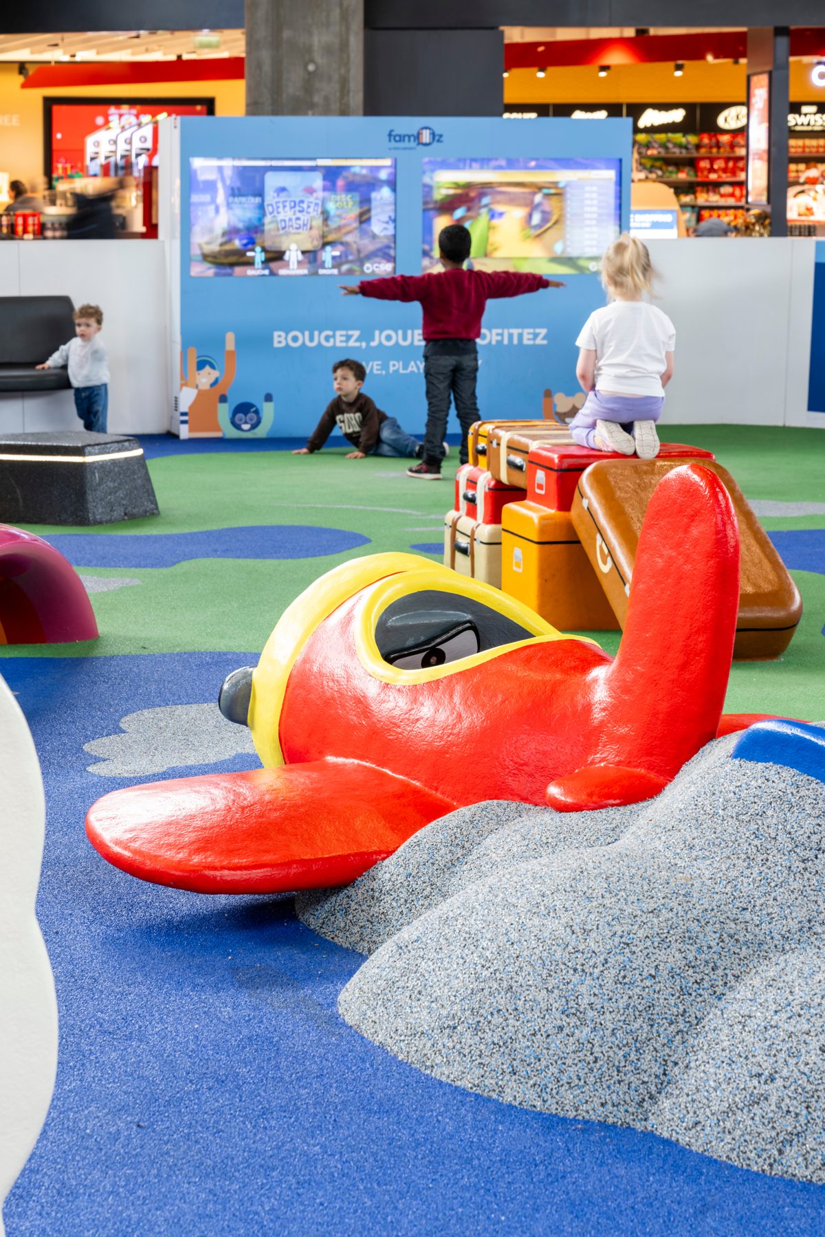 Play structure with a slide in a shopping centre