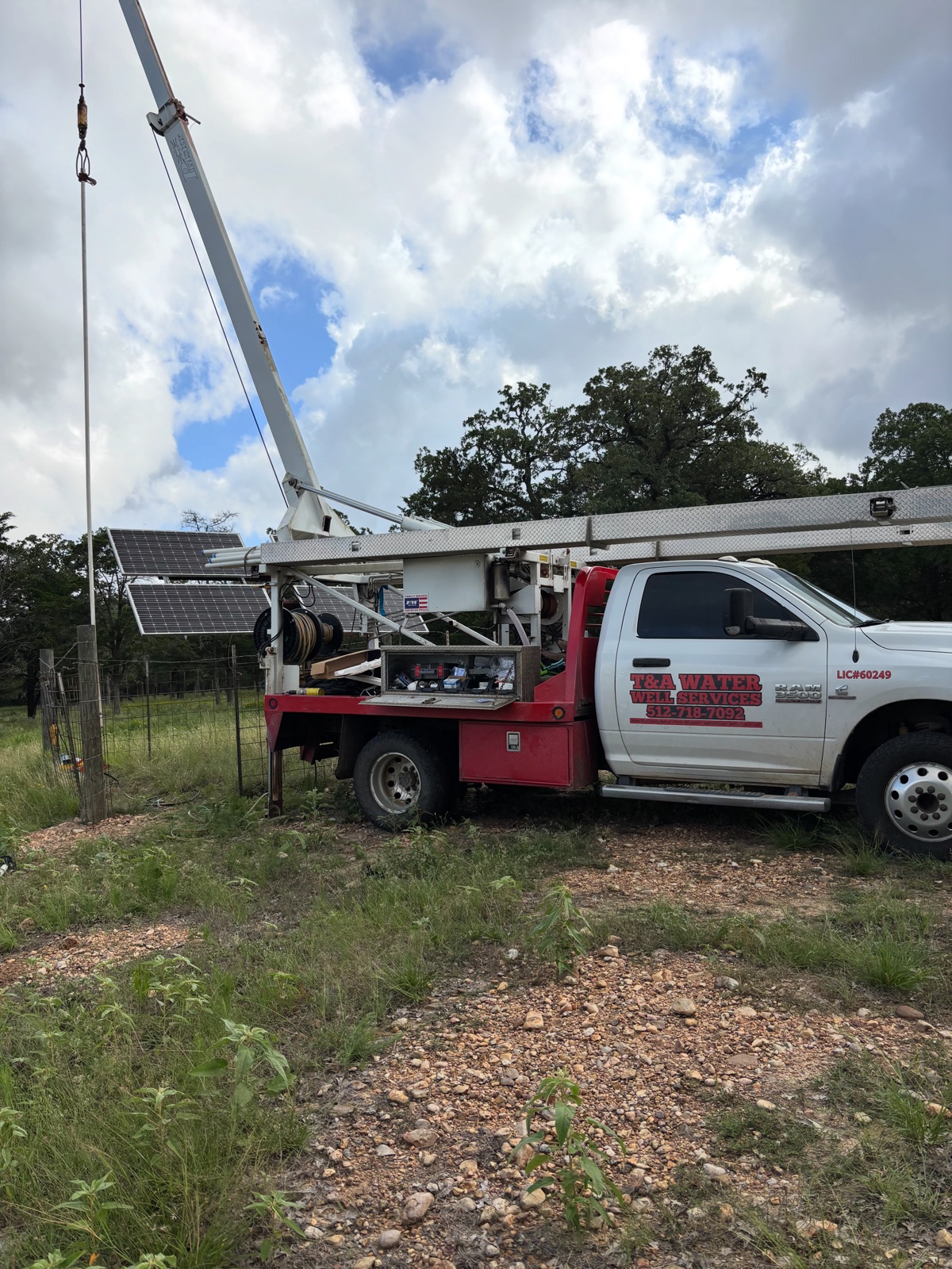 T&A crane truck servicing a solar-powered well pump