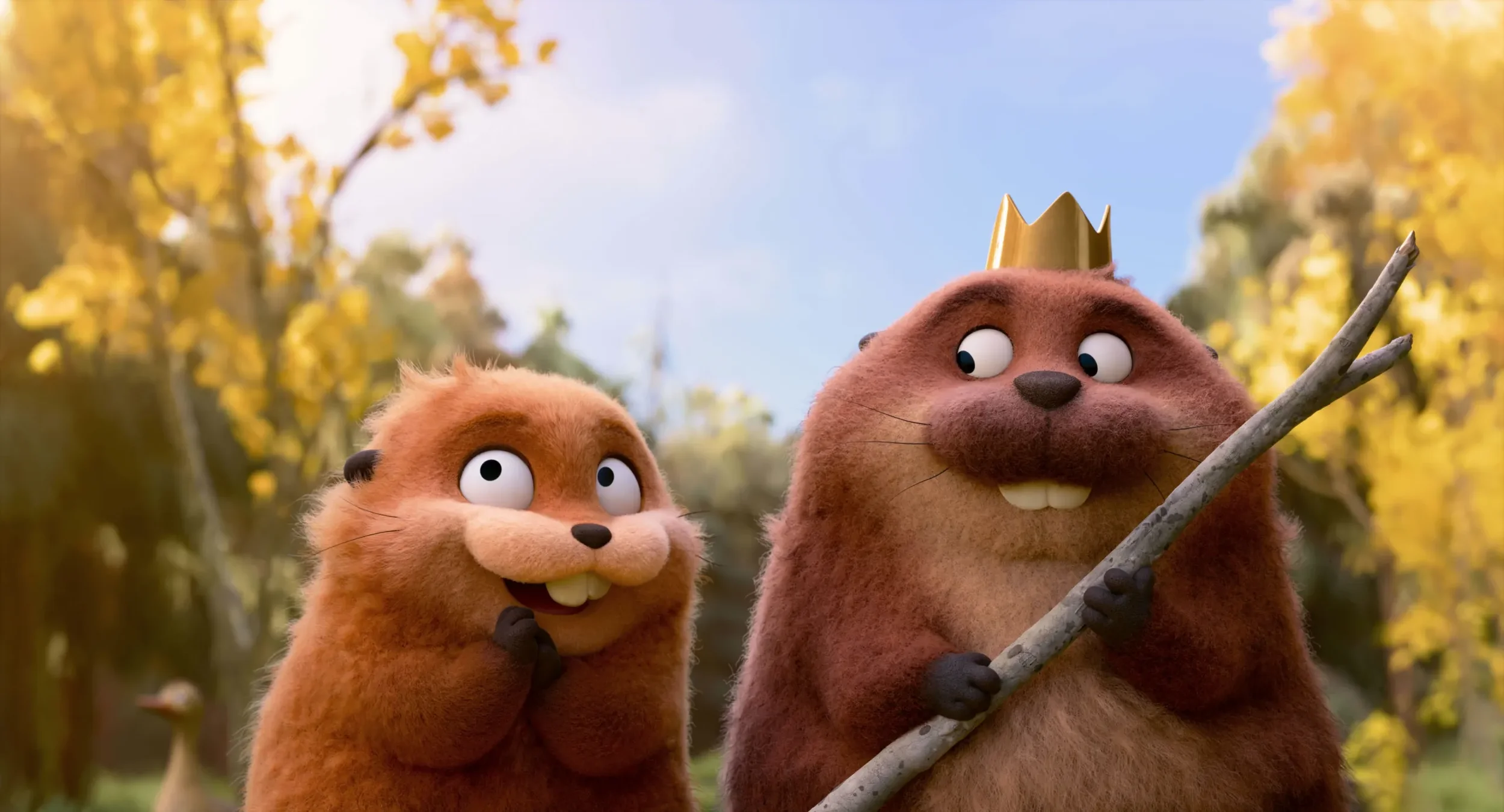 A still from the animated film Hoppers showing two beavers, one wearing a crown