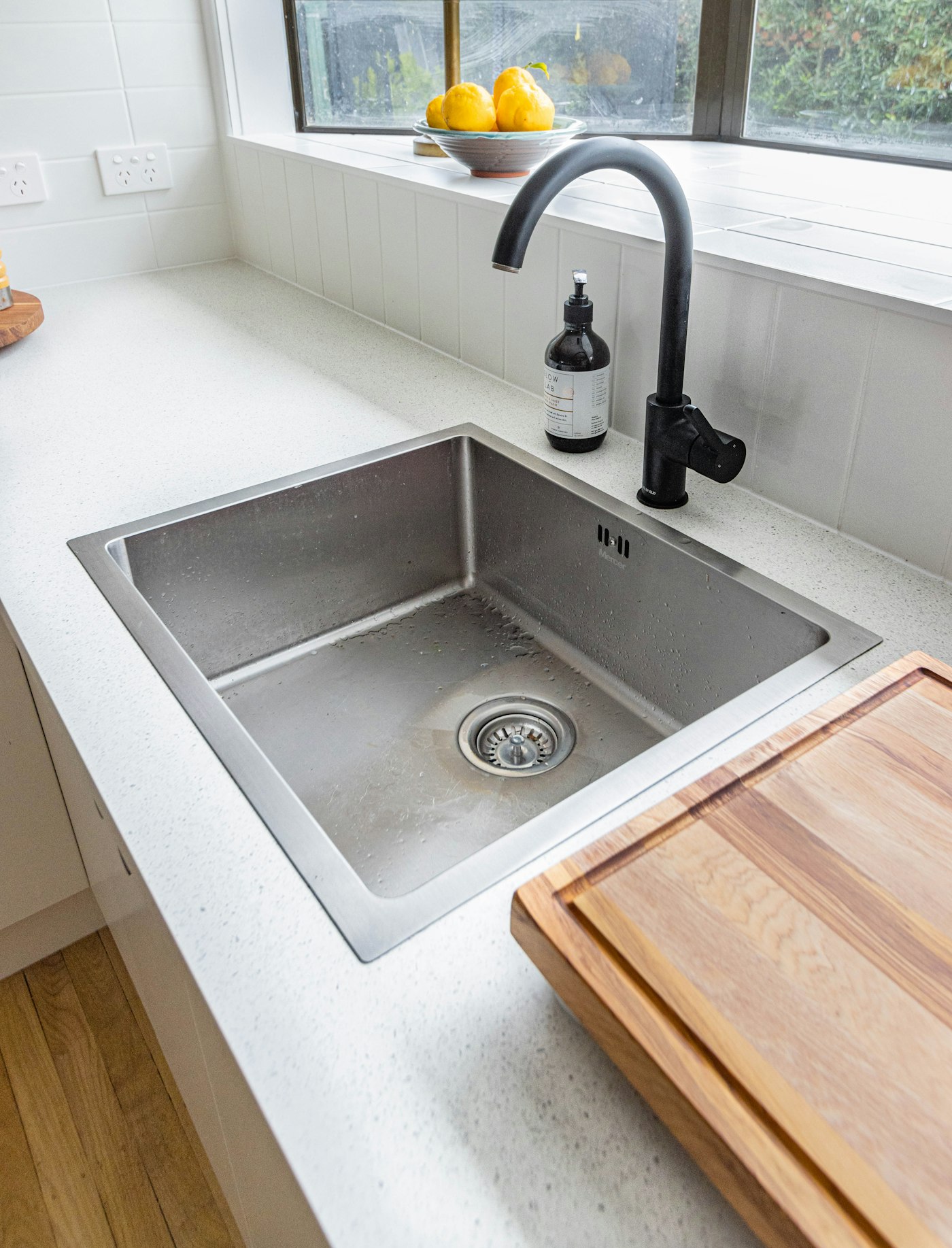 Stainless steel kitchen sink and faucet