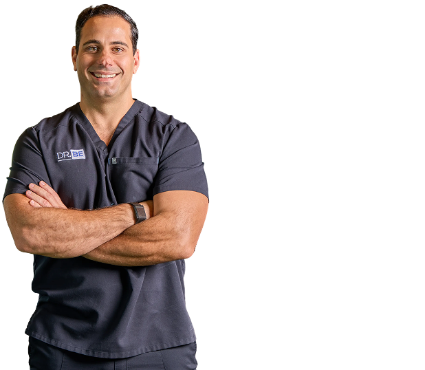 Three smiling medical professionals wearing black scrubs with DR. BE logos pose against a black background.