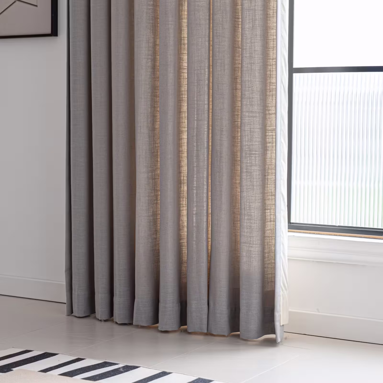 Noise cancelling curtains installed in an office space