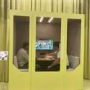 Yellow Persy Booth installed in an open-plan workspace