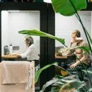 Professionals working inside Persy Booths soundproof office pods a modern acoustic workspace solution providing focus, privacy, and comfort in open office environments.