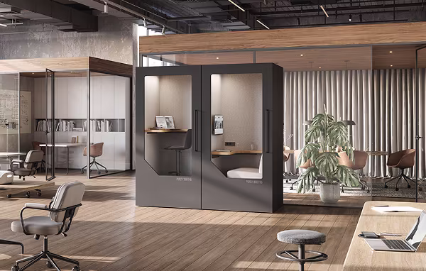 Several Persy booths arranged across a large modern office for flexible space planning