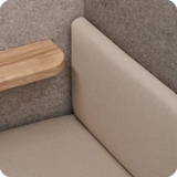 Integrated armrest and padded seat inside Persy Booth for extra comfort