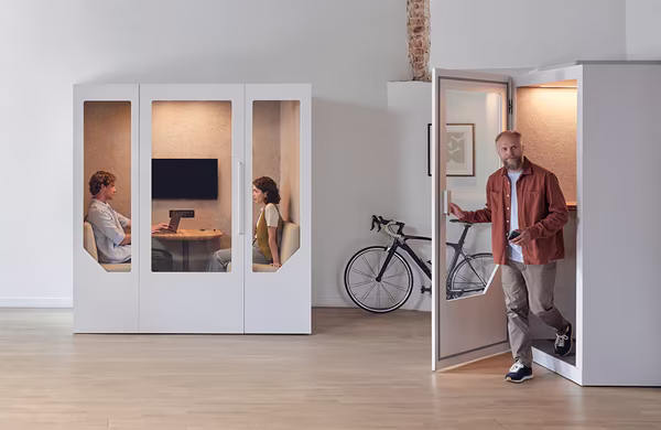 Soundproof office booths creating a premium co-working workspace experience