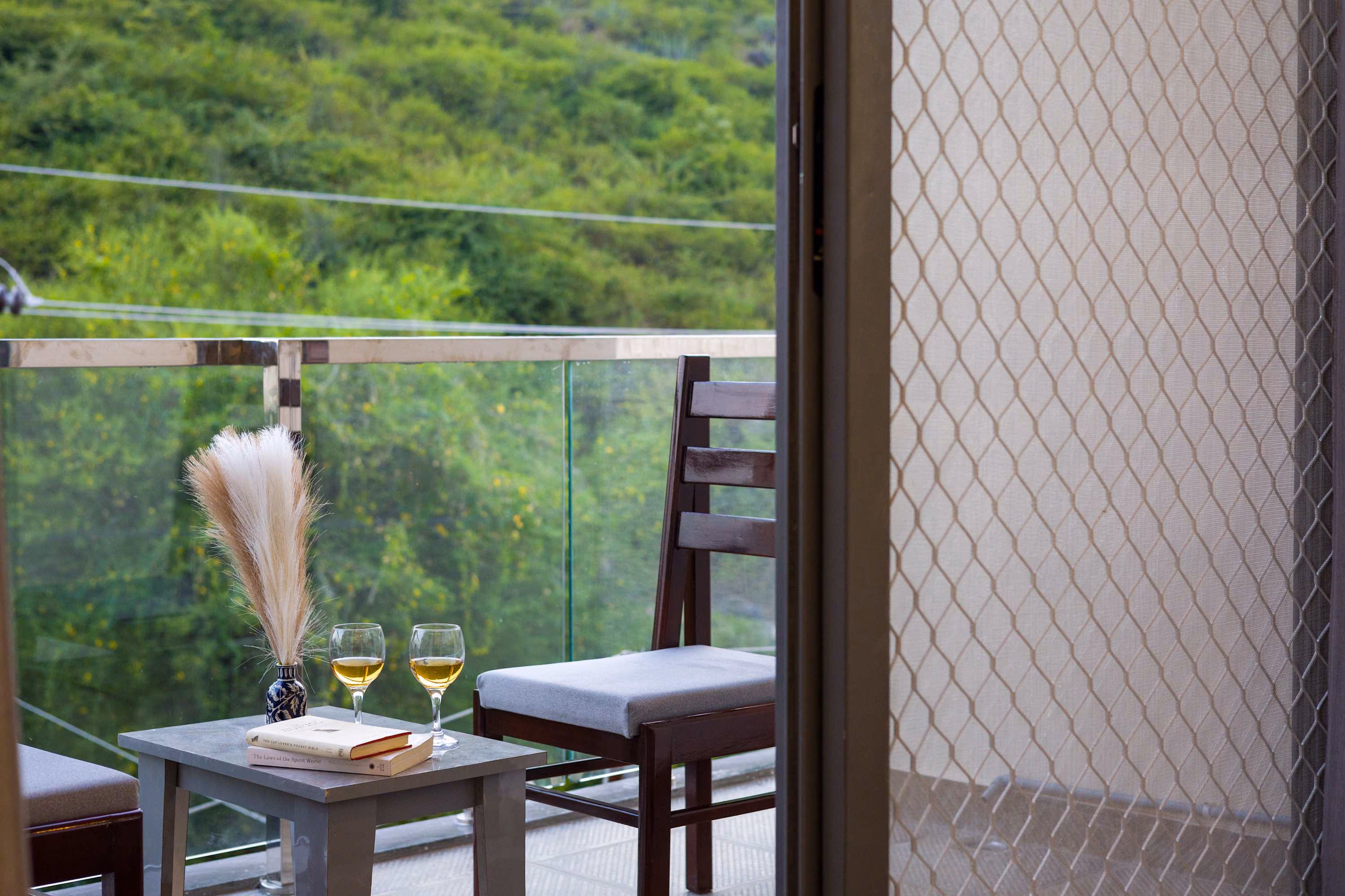 Comfy 2BHK at Lakecity Apartments by Viraalay