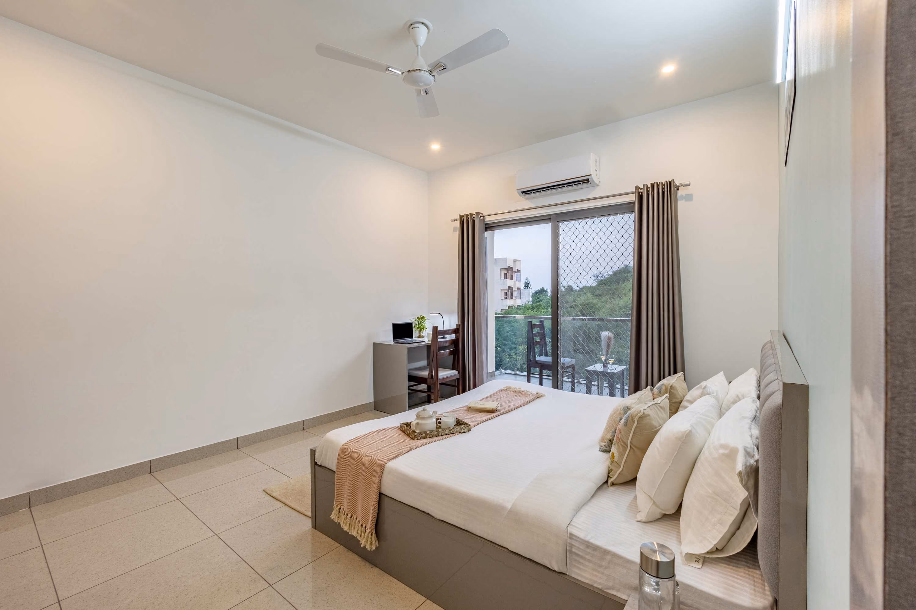 Comfy 2BHK at Lakecity Apartments by Viraalay