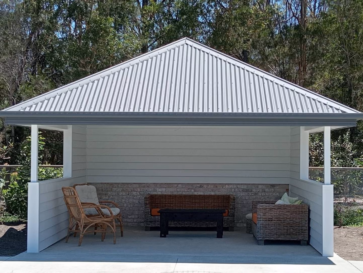 Timber deck with pergola and outdoor dining setting