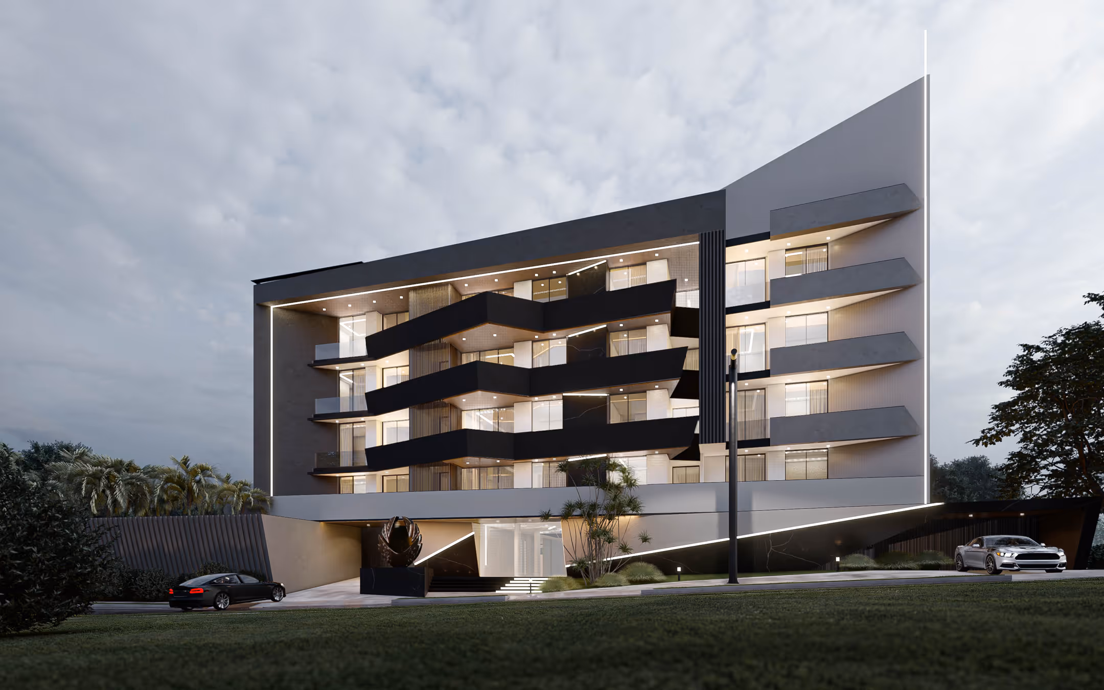 Modern multi-story building with zigzag black balconies, illuminated windows, and cars parked outside at dusk.