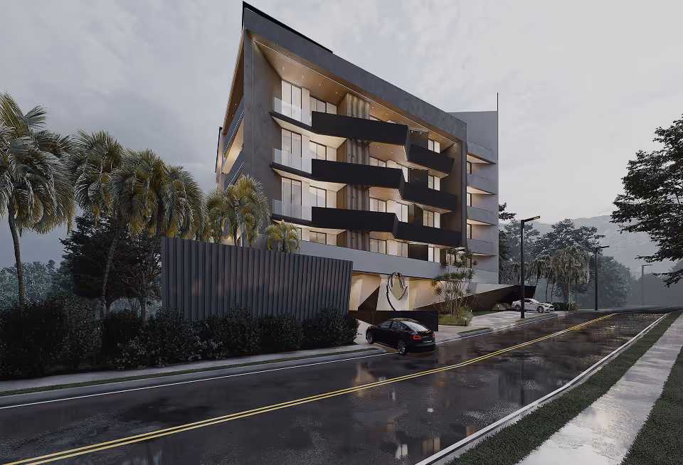 Modern white and gray row houses with palm trees and lush landscaping under a blue sky.