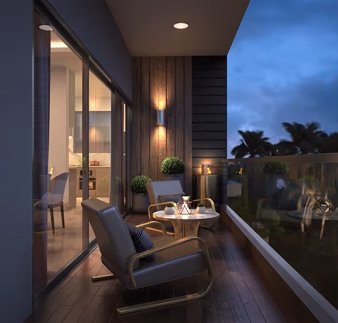 Cozy balcony at dusk with two armchairs, a small round table, potted plants, and glass railing.