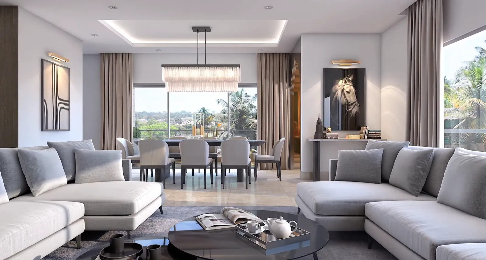 Modern living room with gray sofas, round coffee table, dining area, and large windows with curtains.