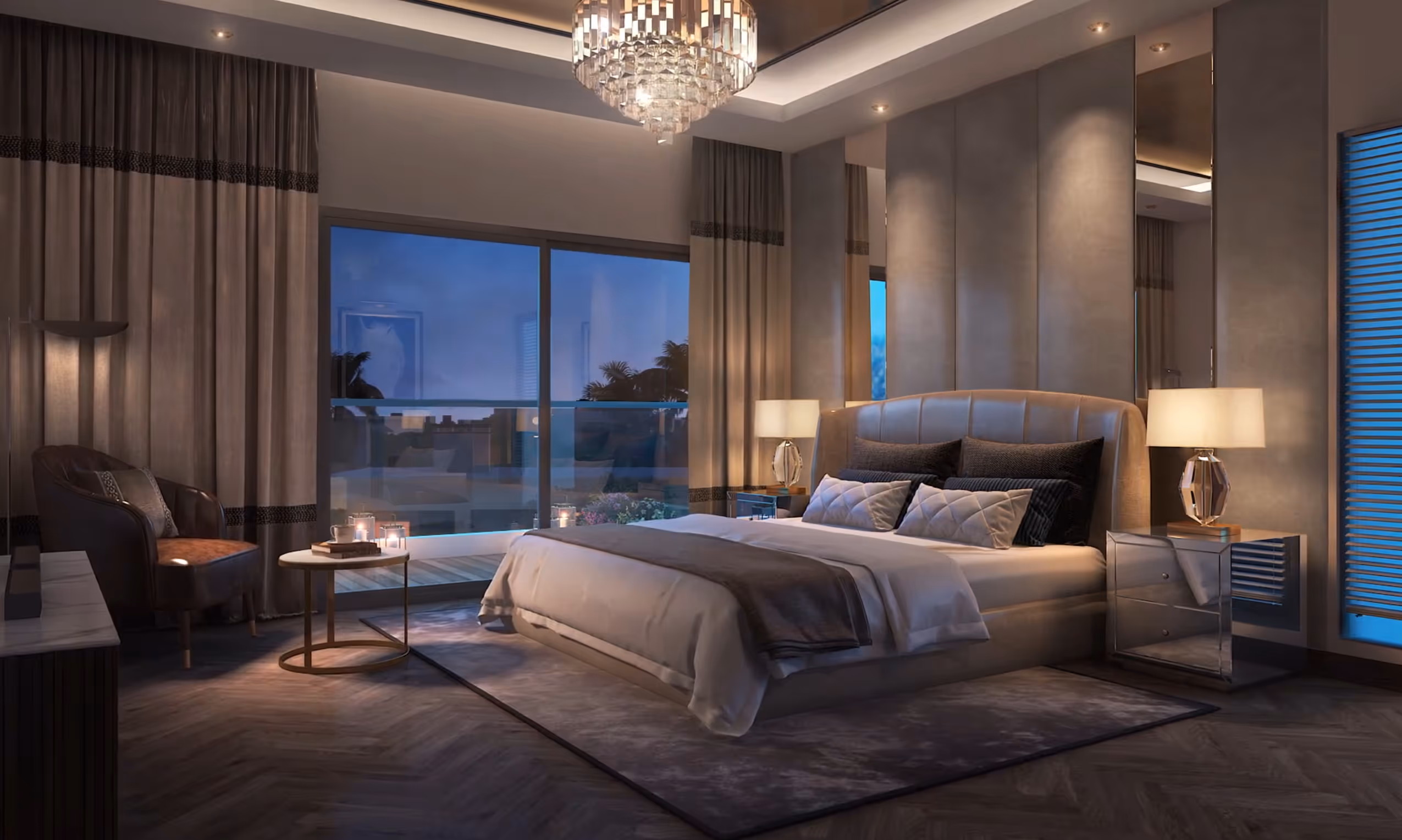Modern bedroom with large bed, nightstands with lamps, armchair, chandelier, and balcony at dusk.