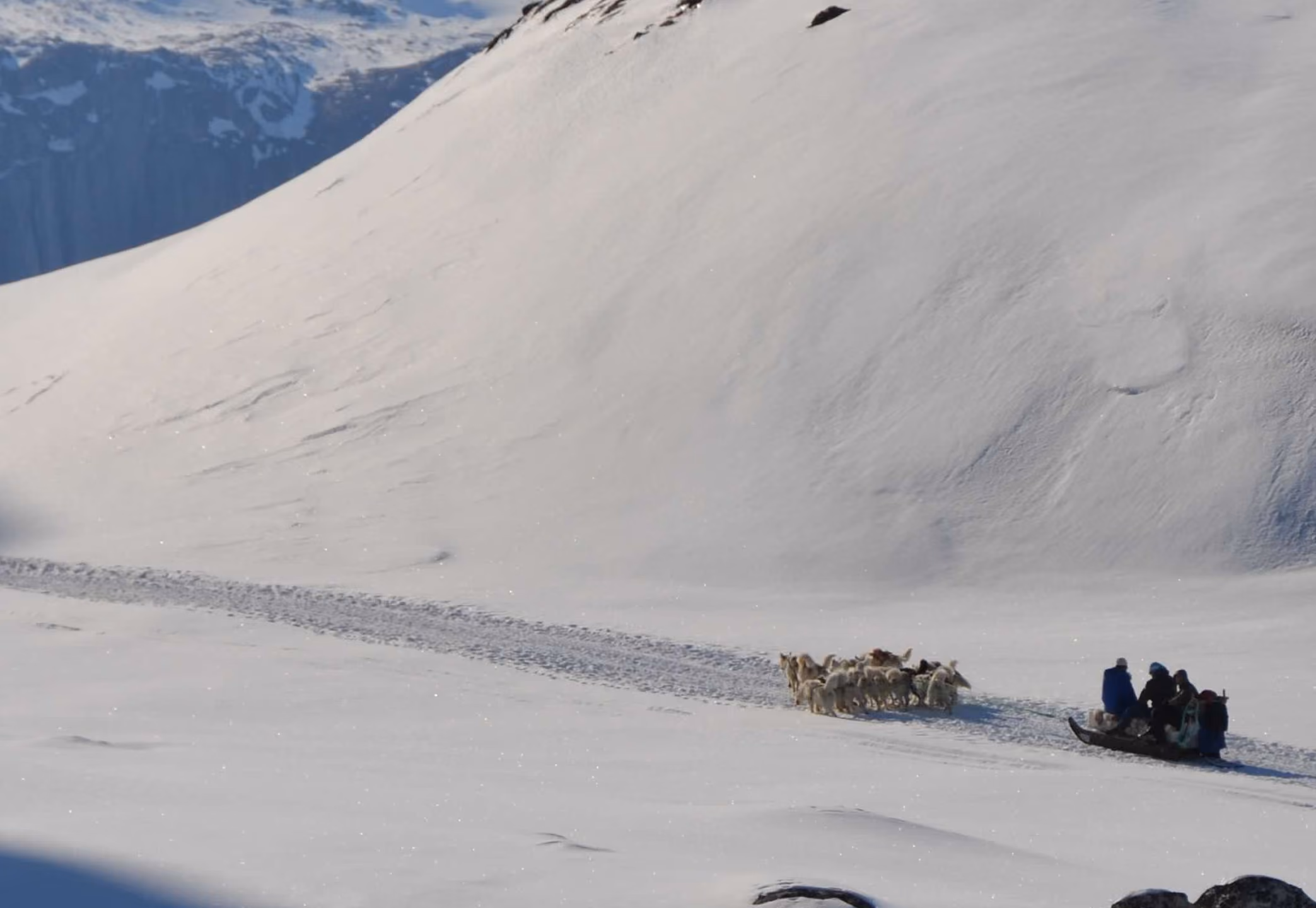 Sled gliding across snow in the Arctic