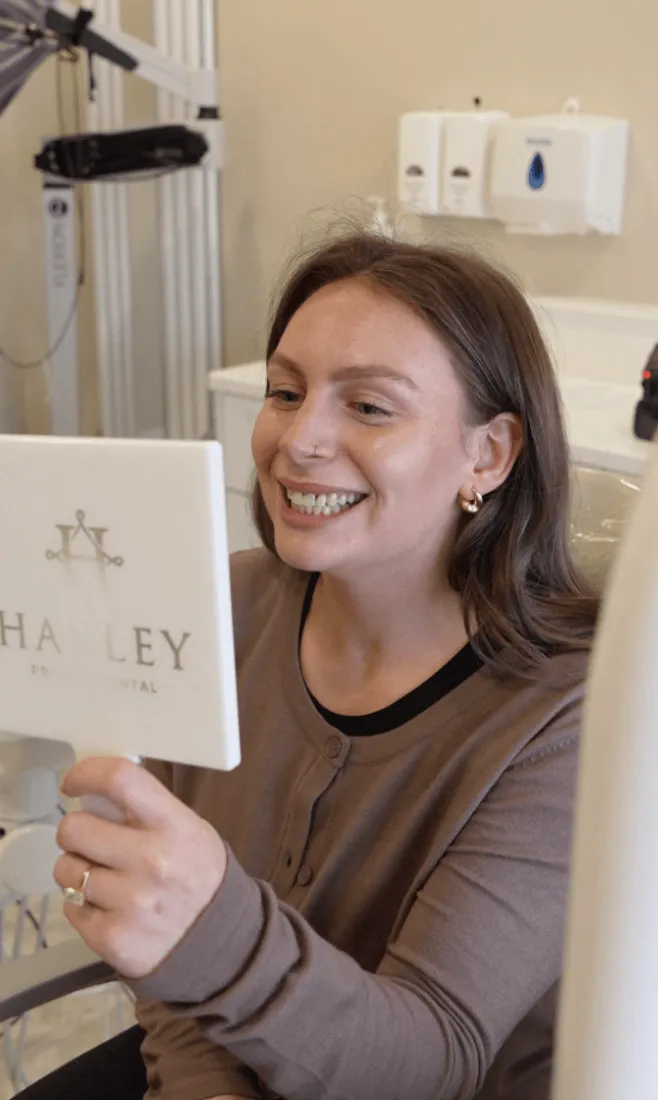 Harley Private dentist greeting a patient in the clinic lounge