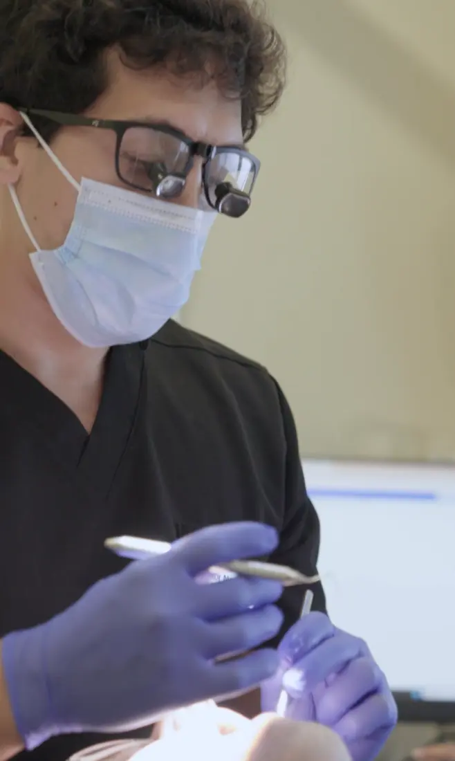 Smiling patient in the dental chair having clinical photos taken at Harley Private