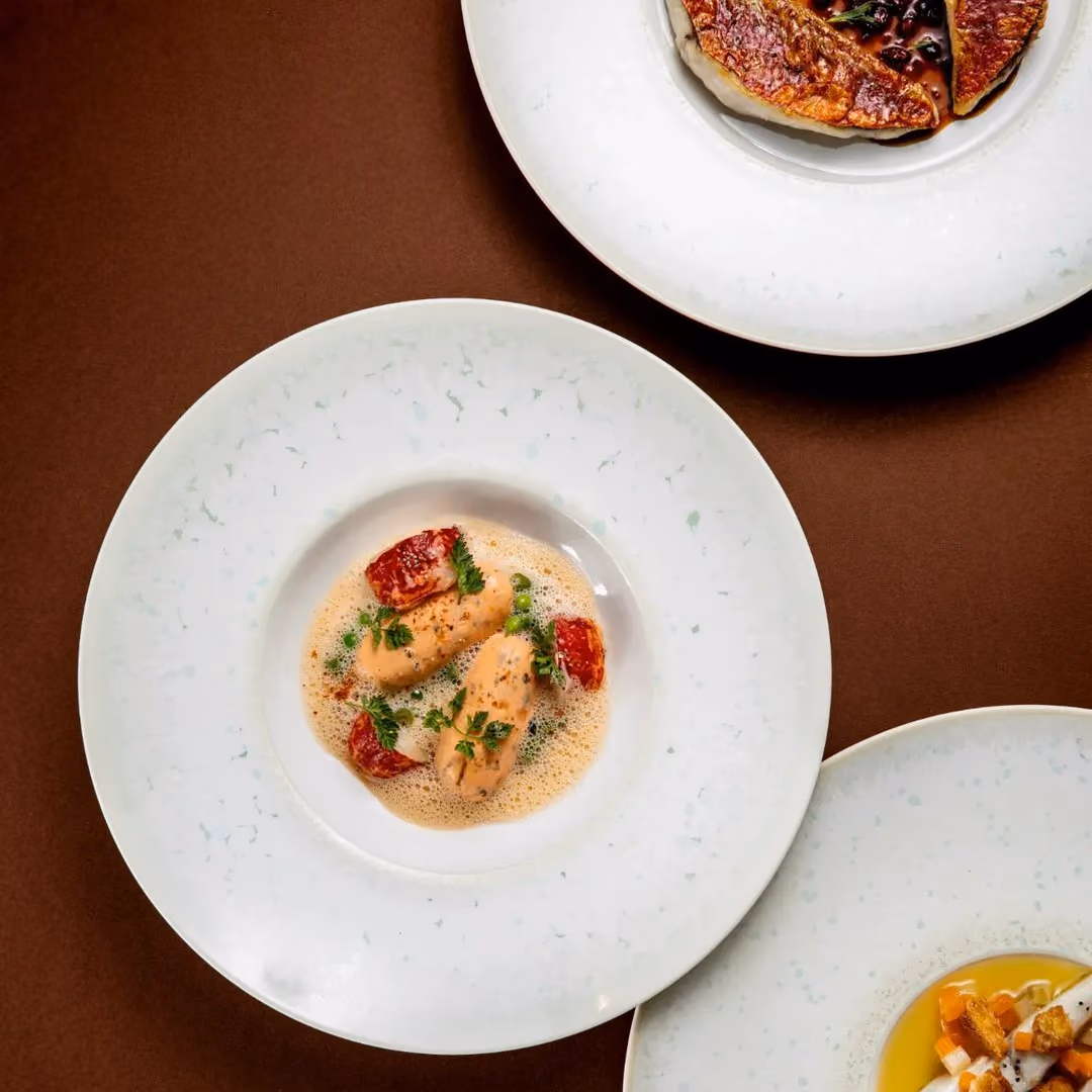 Trois assiettes signature du restaurant Pavyllon Lyon