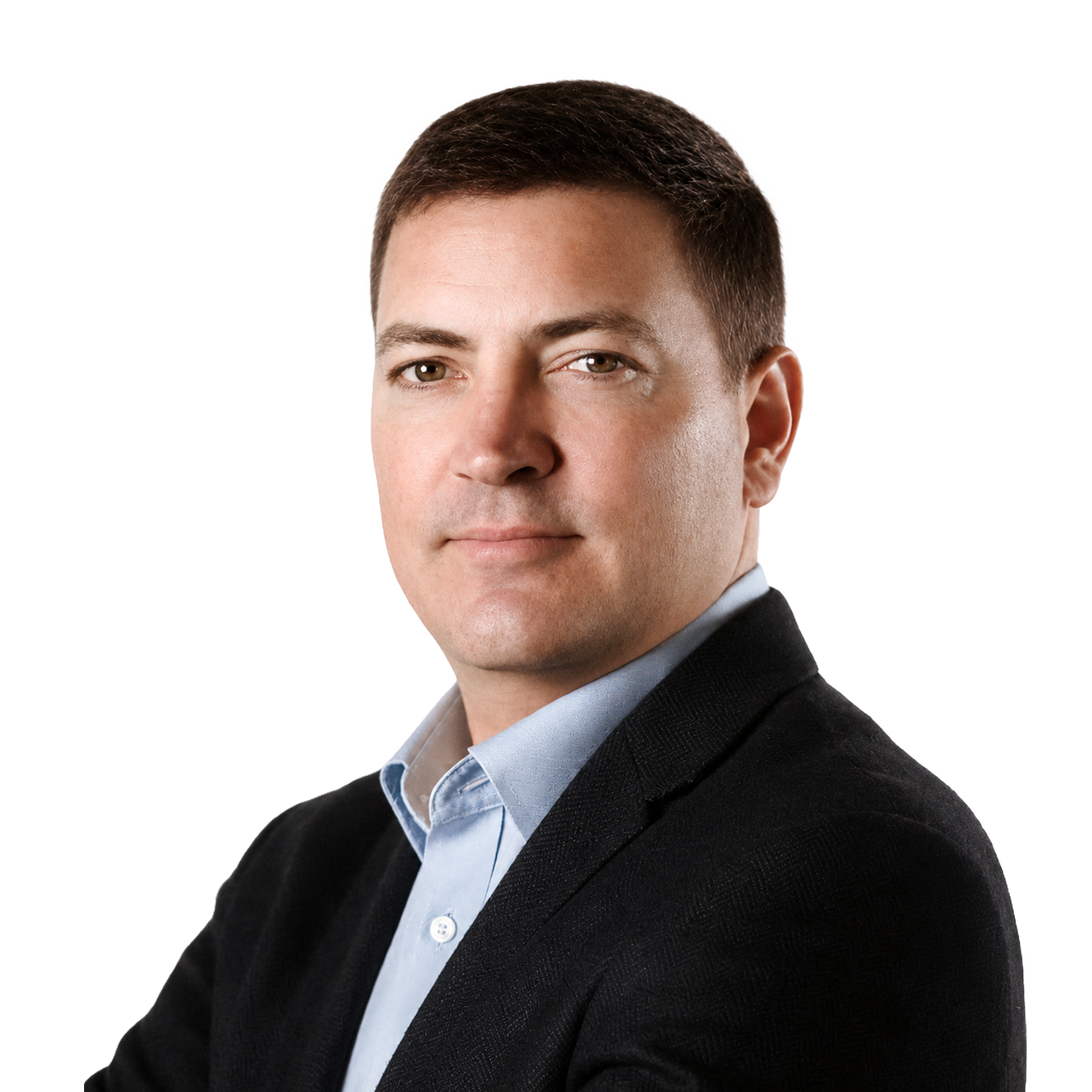Portrait of a man with short brown hair wearing a light blue shirt and dark blazer.